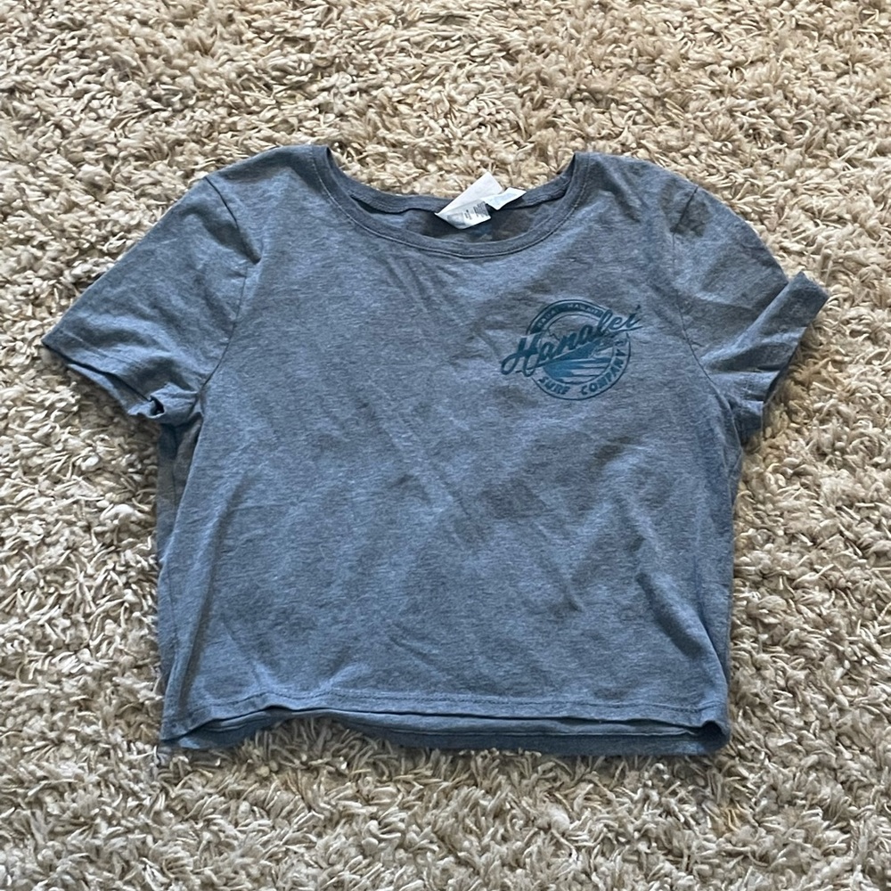 I am selling this shirt that was from Hawaii and the brand is Bella + Canvas.